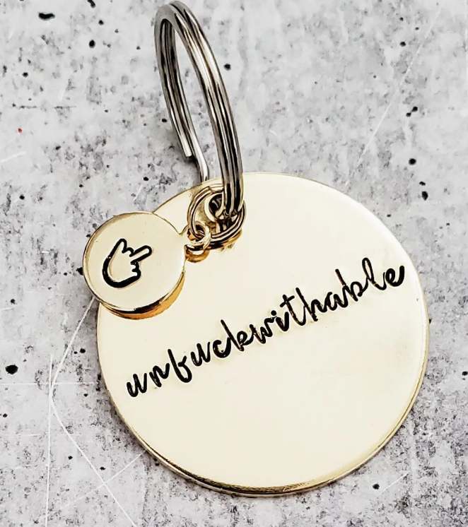 Brass keychains with fun sayings